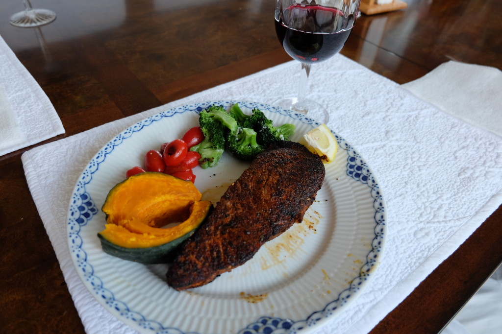 Blackened fish at table